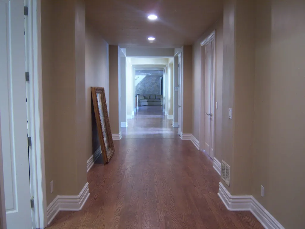 Hallway with newly installed hardwood flooring