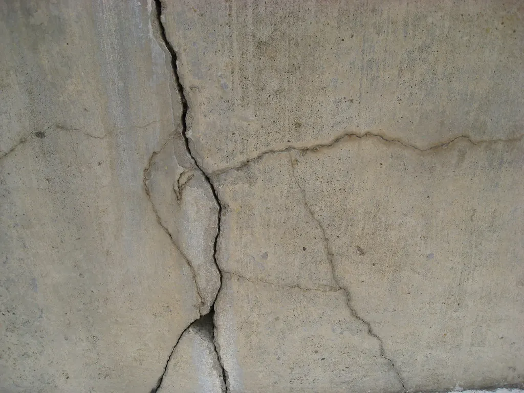 Close-up of cracks in a concrete wall